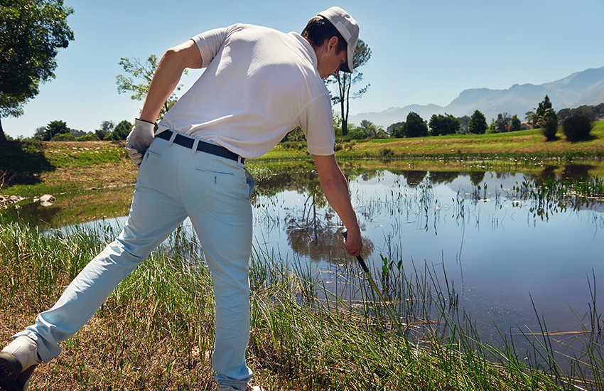 A new golf rule is no penalty for grounding the club in a water hazard