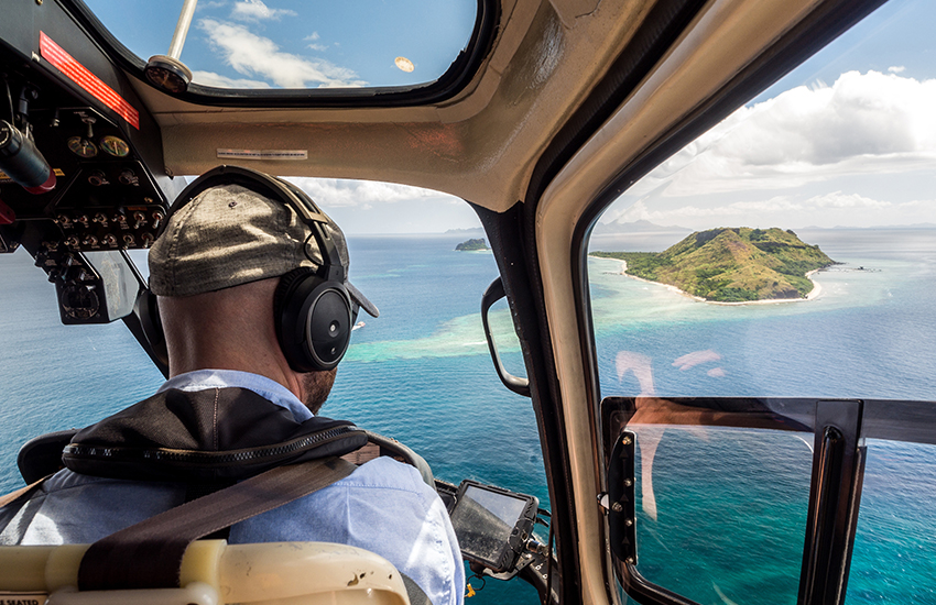 Taking a helicopter tour over Oahu in Hawaii