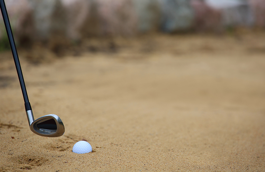A new golf rule change is no penalty for removing loose impediments around the ball in bunker