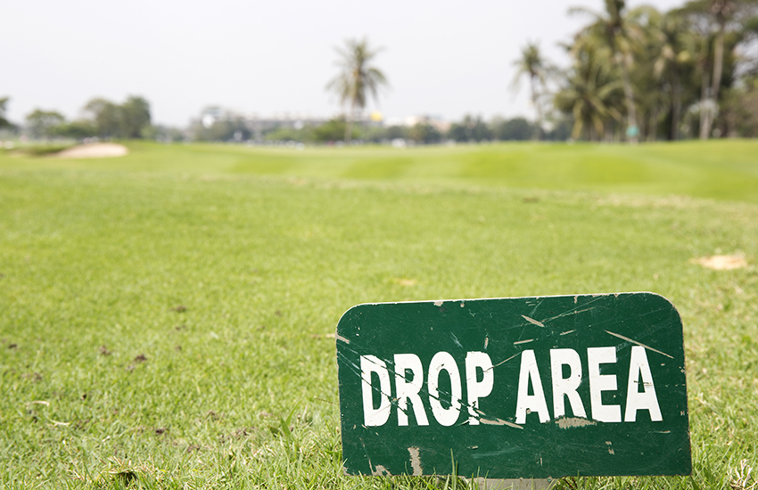 A new rule for golf is dropping the golf ball at knee length