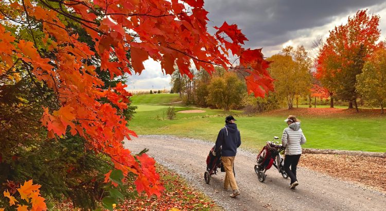 Golfers wearing fall golf outfits